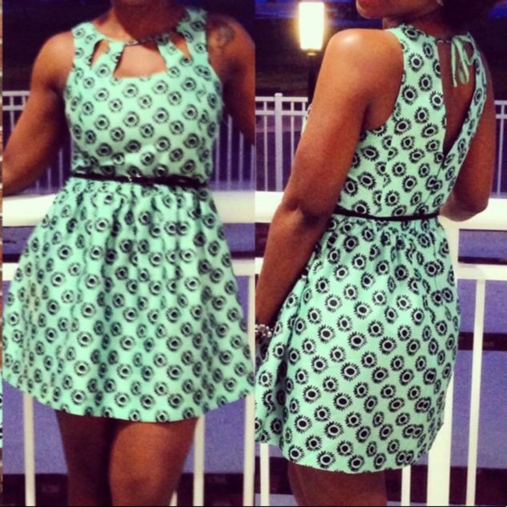 Short cocktail dress with cutouts